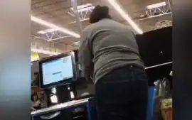 Sexy ass on brunnete milf in jeans at self checkout