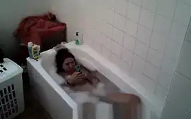 Big tittied college slut Aylie takes a bath
